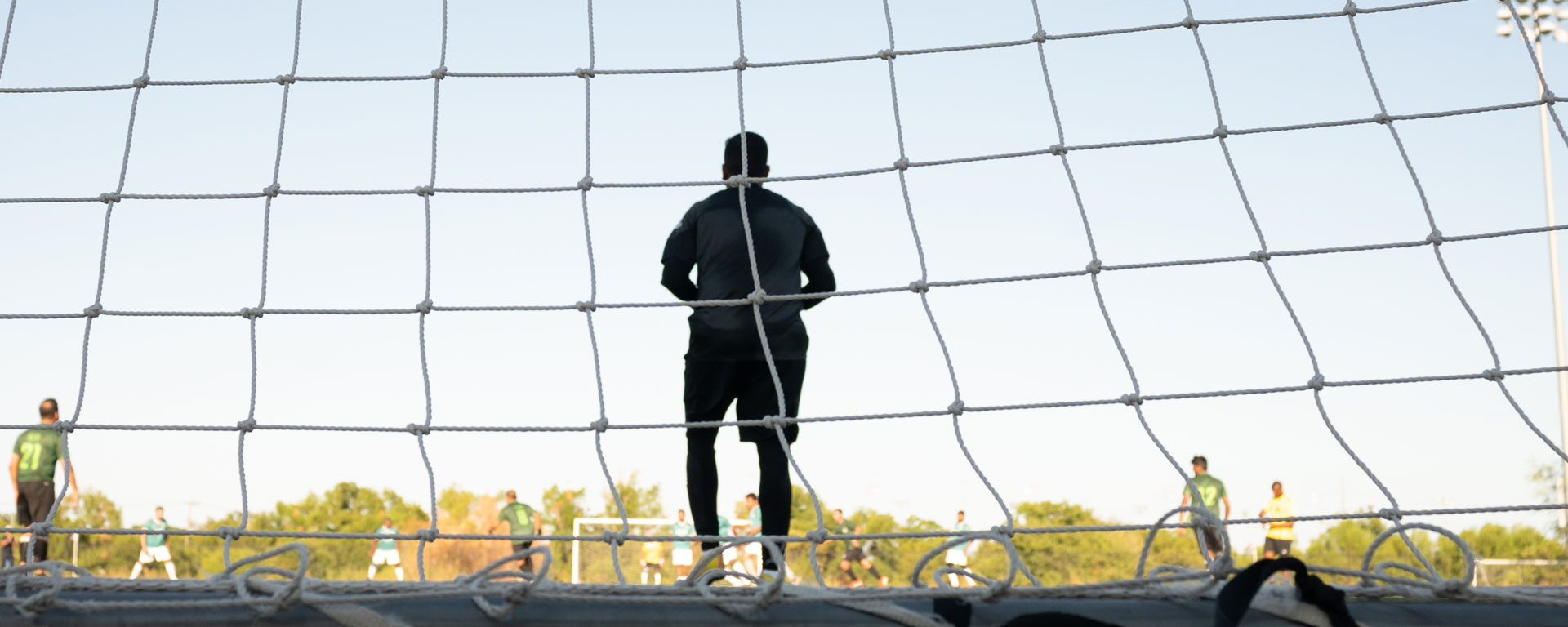 Goalkeeper making a spectacular save.
